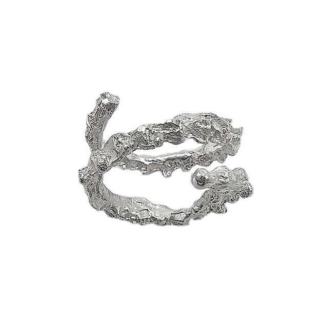 Amazon · Double Coil Snakebone Silver Ring — Silver ring with a textured design on a white background