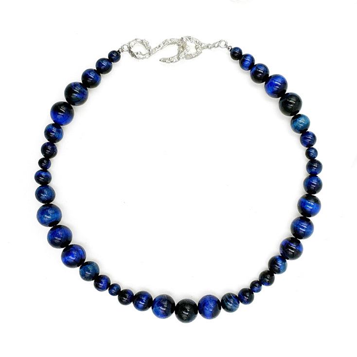 Amazon · Snakebone S-Hook Tiger’s Eye Choker Necklace — Necklace with blue and black beaded design on a white background