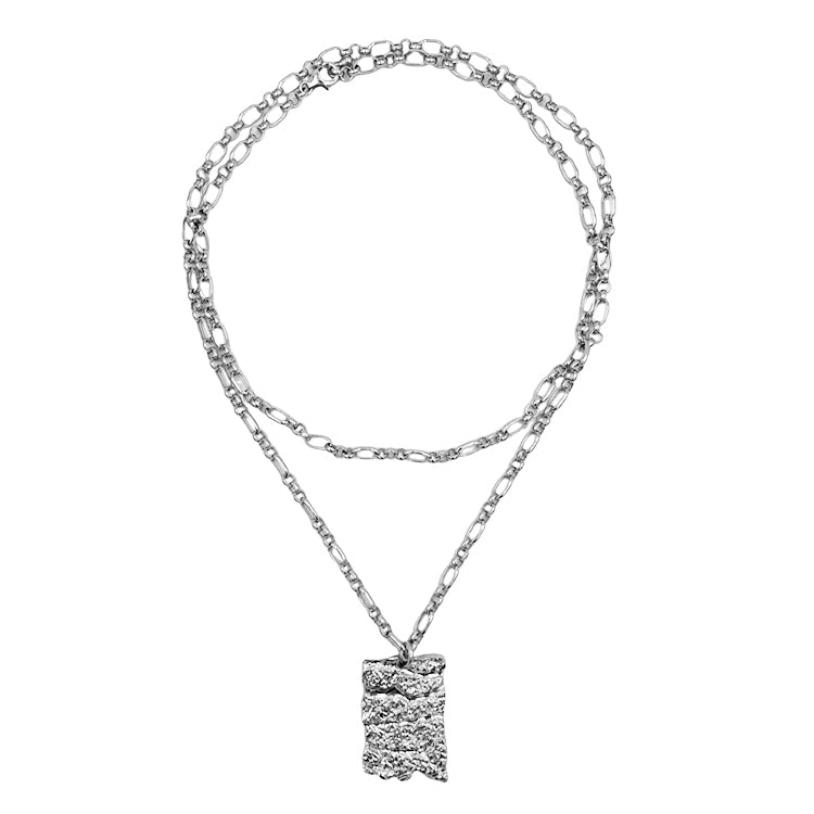 Amazon · Tree Grain Long Necklace — Silver necklace with a square pendant on a white background