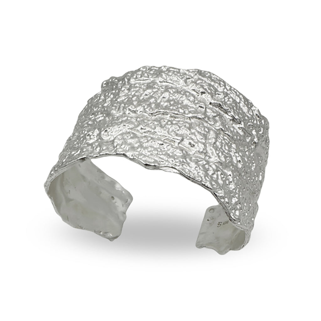 Amazon · Tree Grain Wide Bangle Bracelet — Silver textured cuff bracelet on a white background