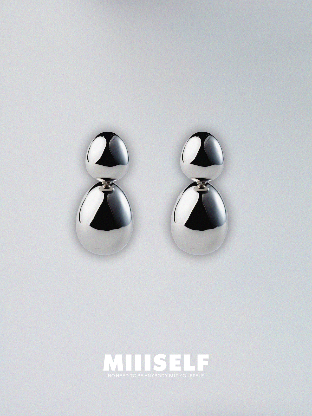 Ant Silhouette Earrings — MIIISELF subtle everyday earrings combining minimalist design with symbolic vitality and elegance.”