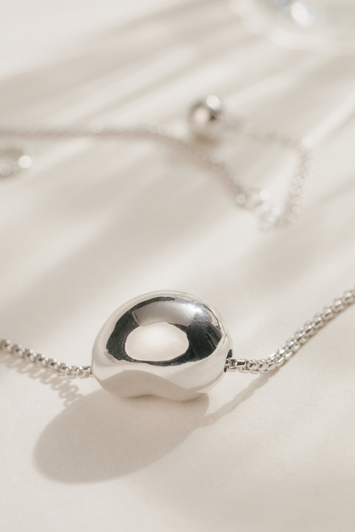Asymmetric Heart Necklace — MIIISELF adjustable silver heart necklace designed for everyday wear with understated elegance.”