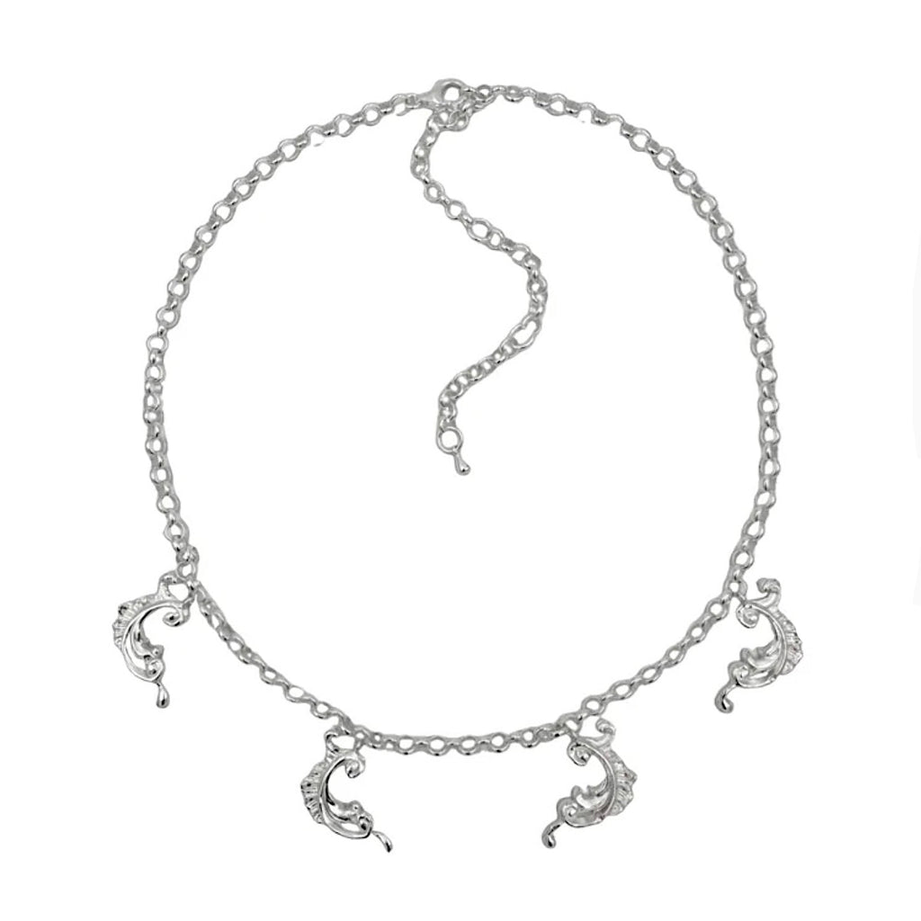 Baroque Totem Choker — Silver necklace with moon-shaped charms on a white background