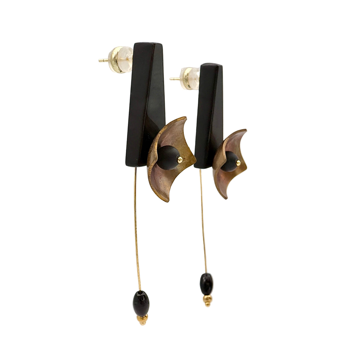 Black Hibiscus Lacquer Quasi-Maki-e Earrings — Pair of black and gold earrings on a clear stand