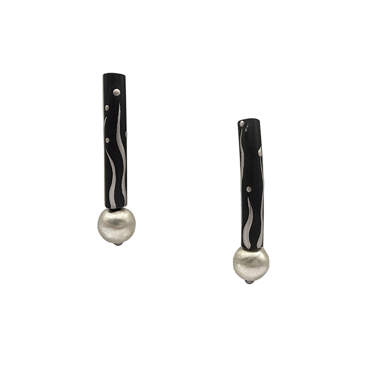 Black Orchid Lacquer Quasi-Maki-e Earrings — Pair of earrings with black and silver design on a white background