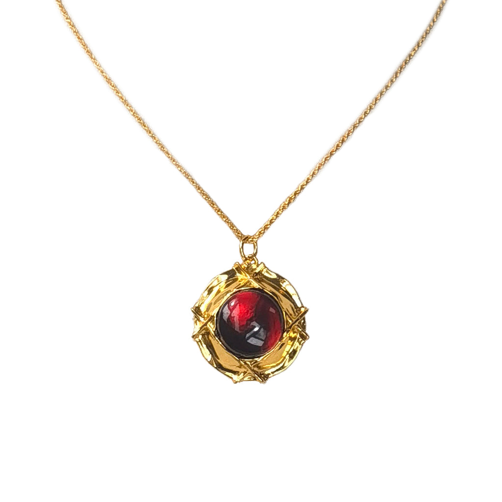 Meicily Blood Amber Flower Necklace featuring natural blood amber cabochon framed in gold-plated 925 sterling silver.