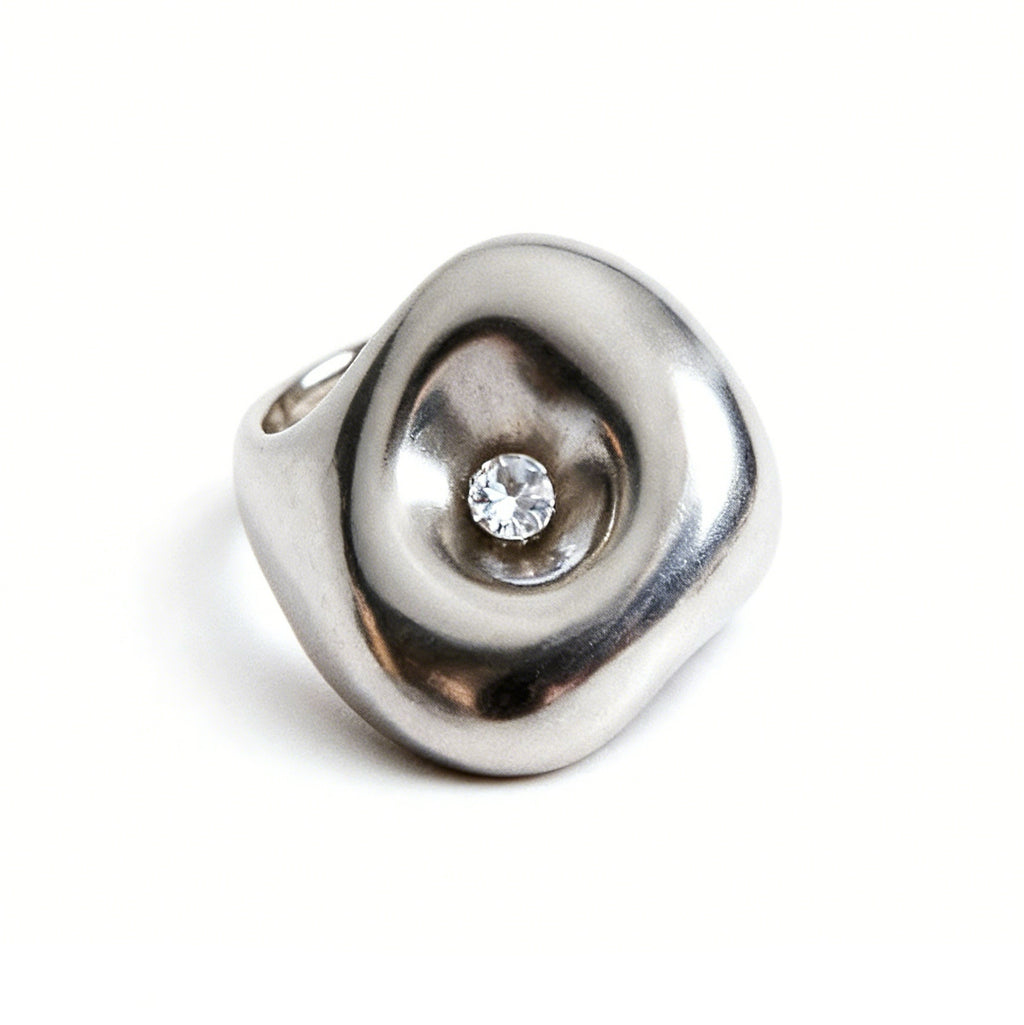 Breathing Geometry · Moissanite & Silver Ring — Silver ring with a diamond on a white background