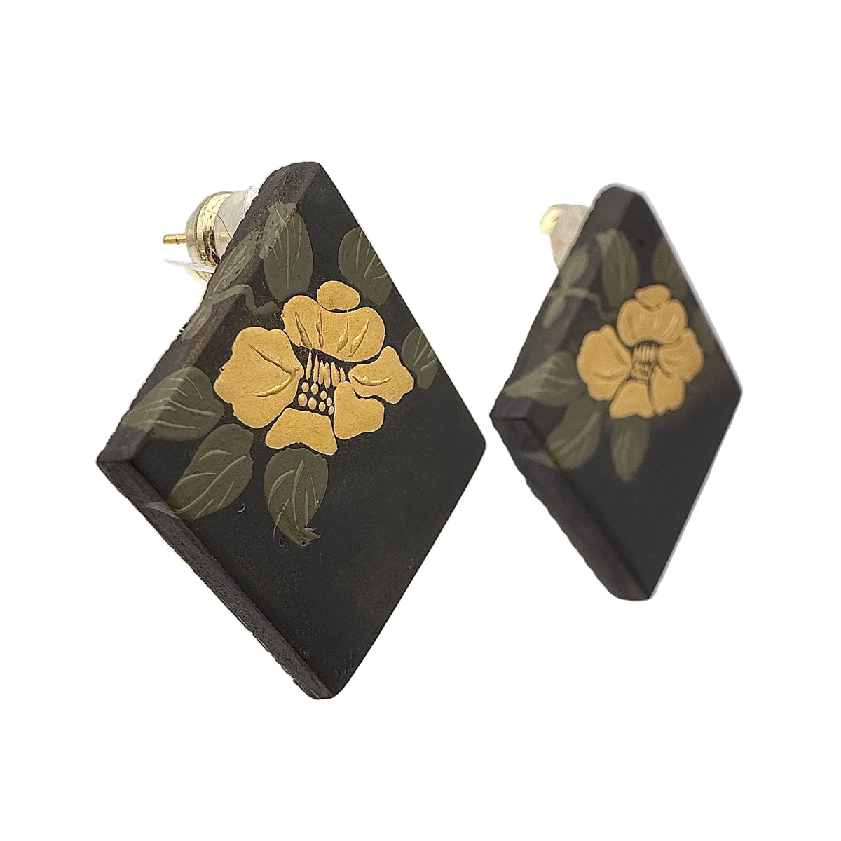 Camellia Lacquer Quasi-Maki-e Earrings — Pair of earrings with yellow floral design on black background