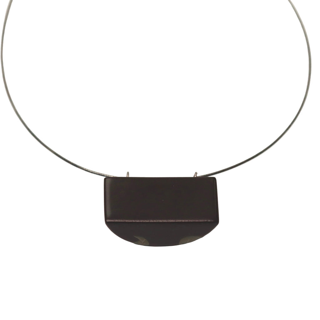 Camellia Lacquer Quasi-Maki-e Necklace — Black necklace with a rectangular pendant on a white background
