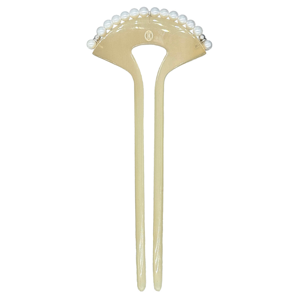 Crimson Touch Pearl Hairpin — Beige hairpin with pearl-like beads on a white background