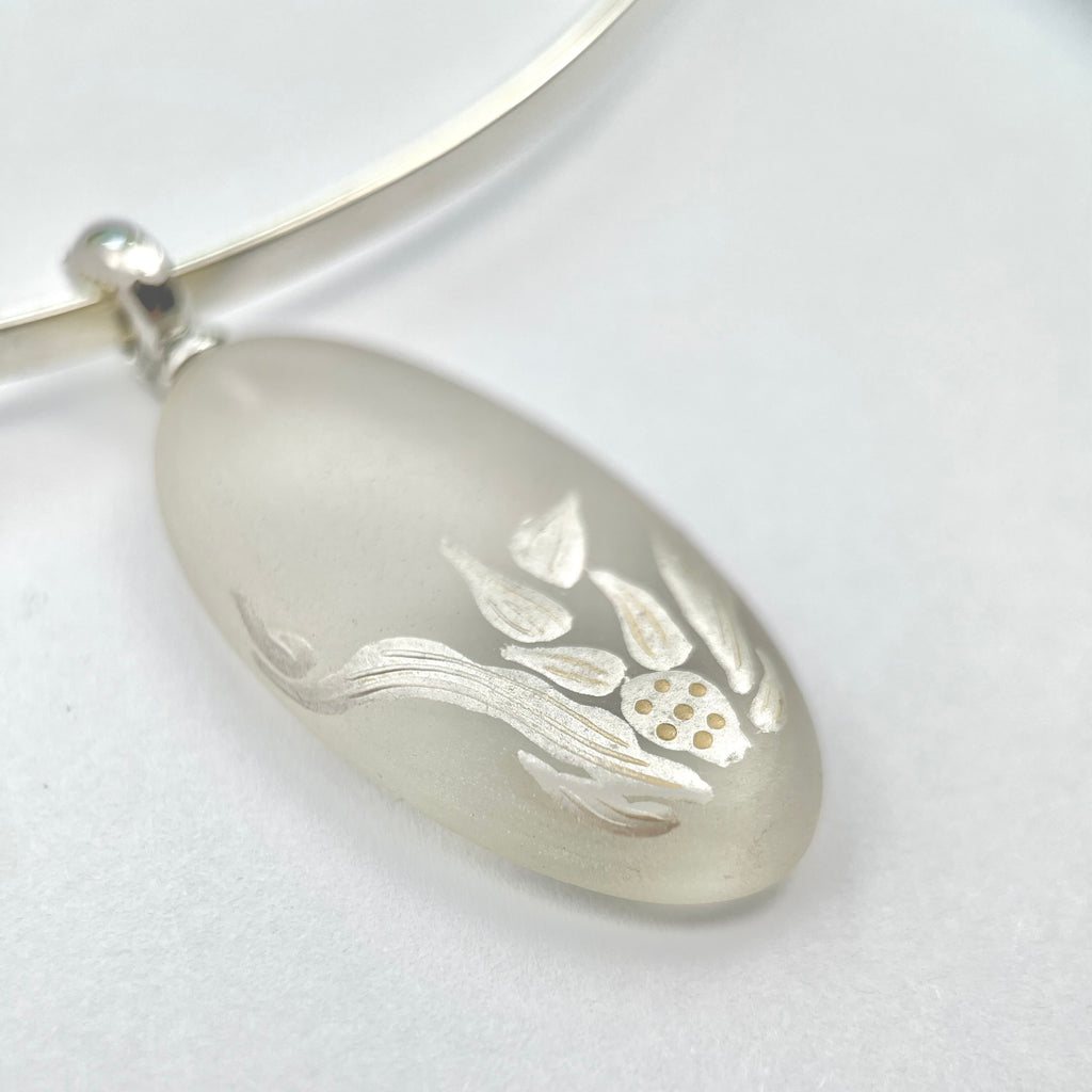 Crystal Hyacinth Lacquer Quasi-Maki-e Pendant Necklace — Silver pendant with a whale design on a white background