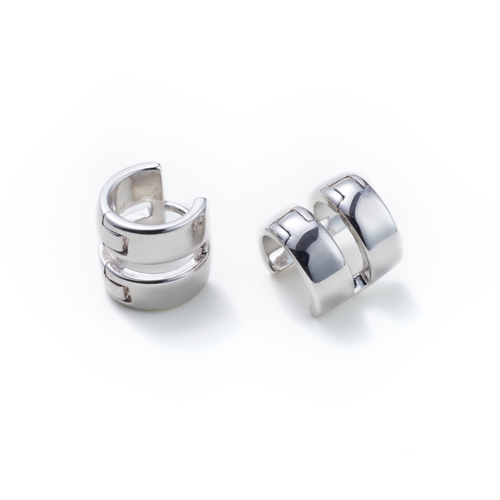 Double-Band Illusion Earrings — Pair of silver hoop earrings on a white background