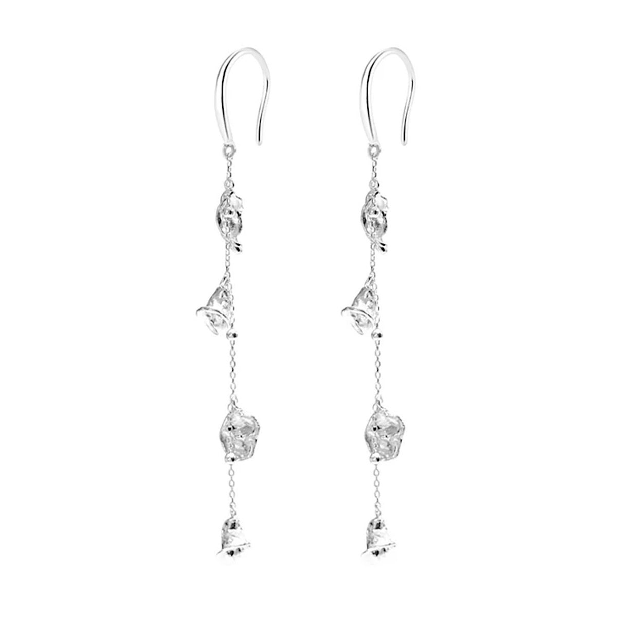 Flora & Blossom Long Earrings — Silver earrings with clear gemstones on a white background
