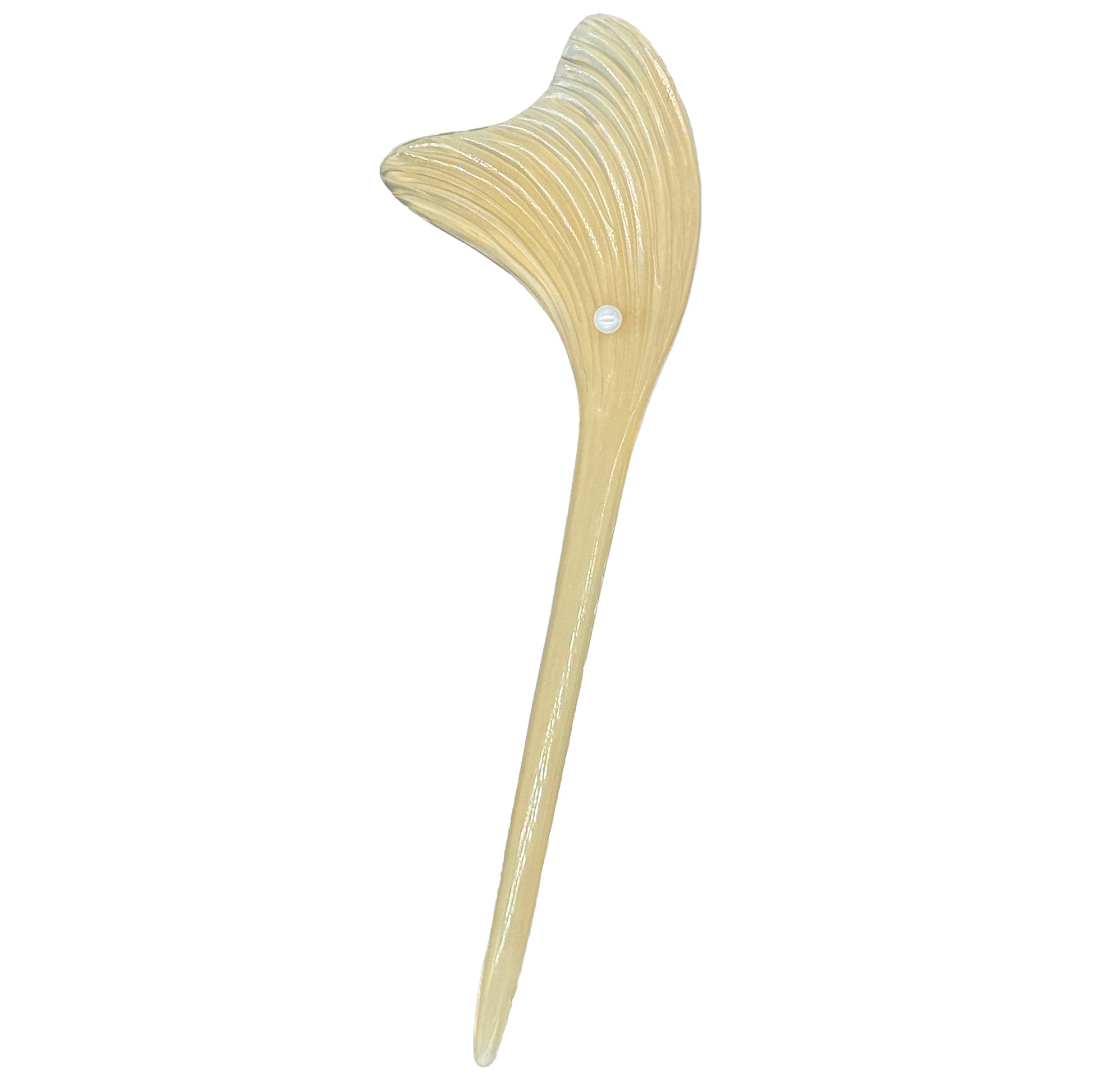 Beige hairpin with a decorative design on a white background