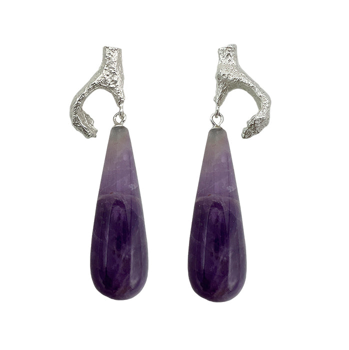 Gold Digger · Gemstones Teardrop Earrings — Pair of purple teardrop earrings with silver tops on a white background