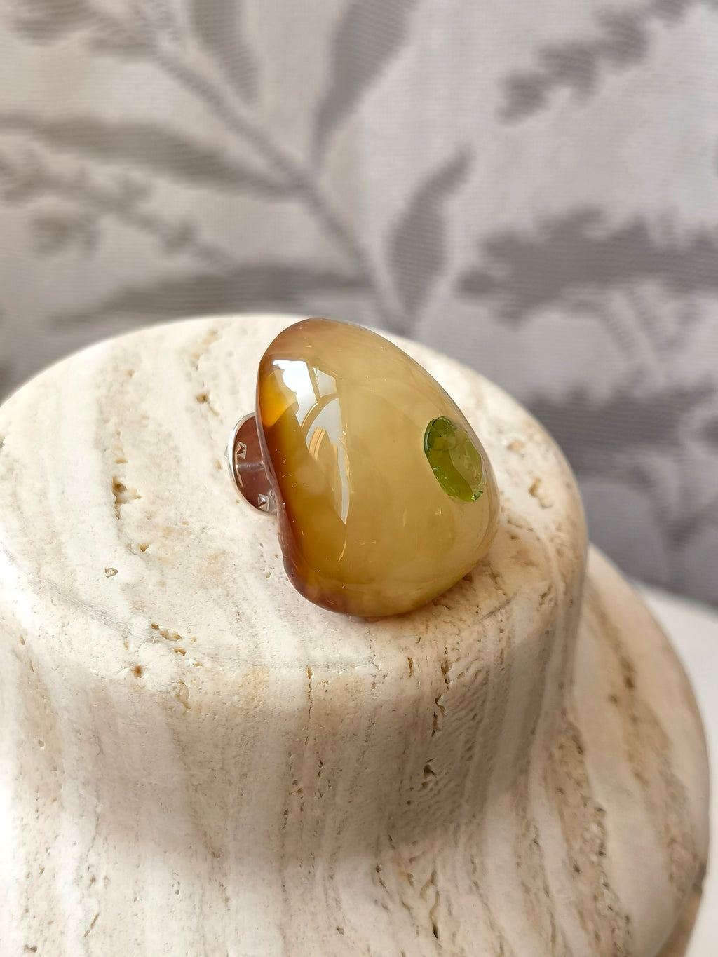 I’m Watching You · Handcrafted Amber & Peridot Brooch — Handmade amber and peridot brooch symbolizing awareness, stillness