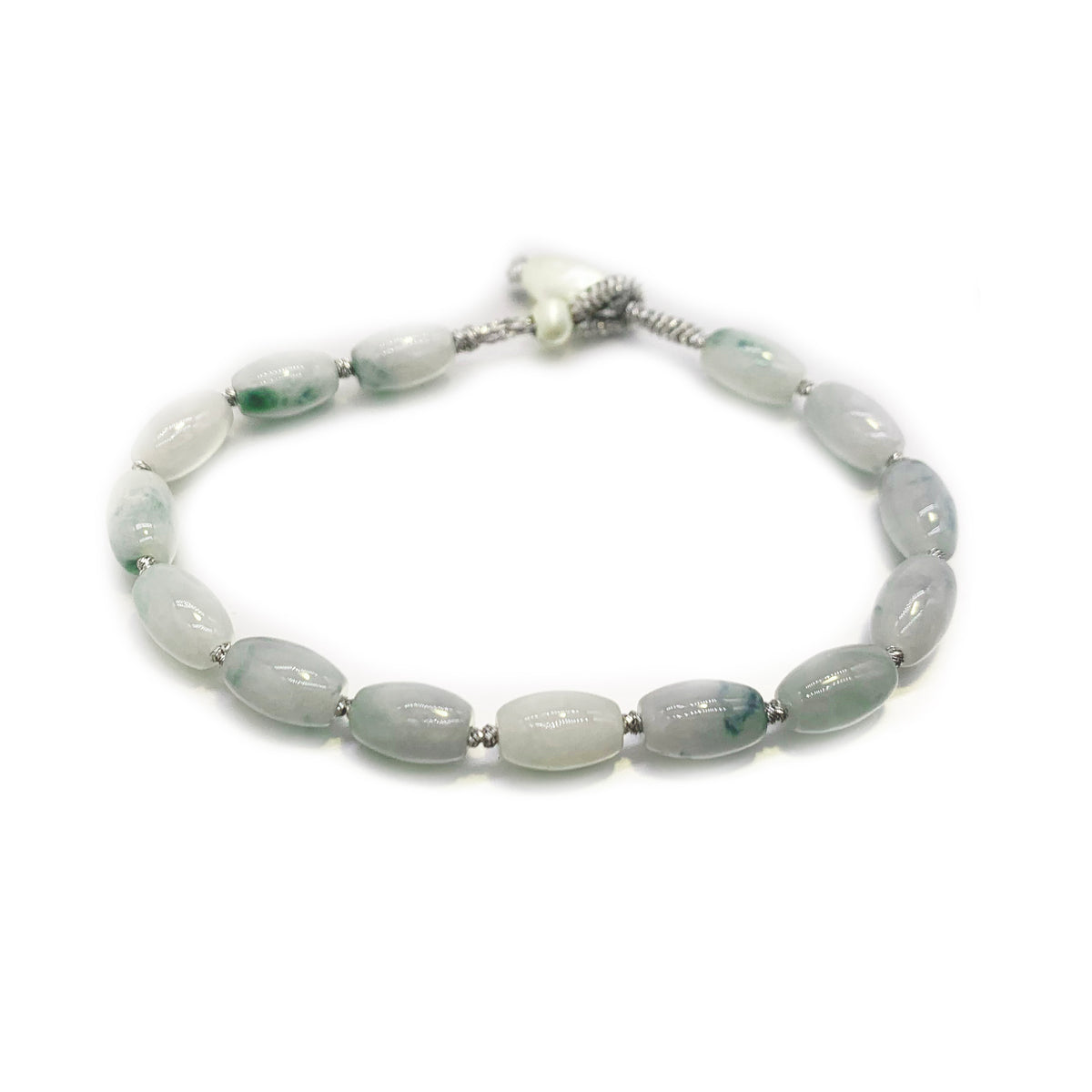 Jade Rice Bead Bracelet — Bracelet with light blue beads on a white background