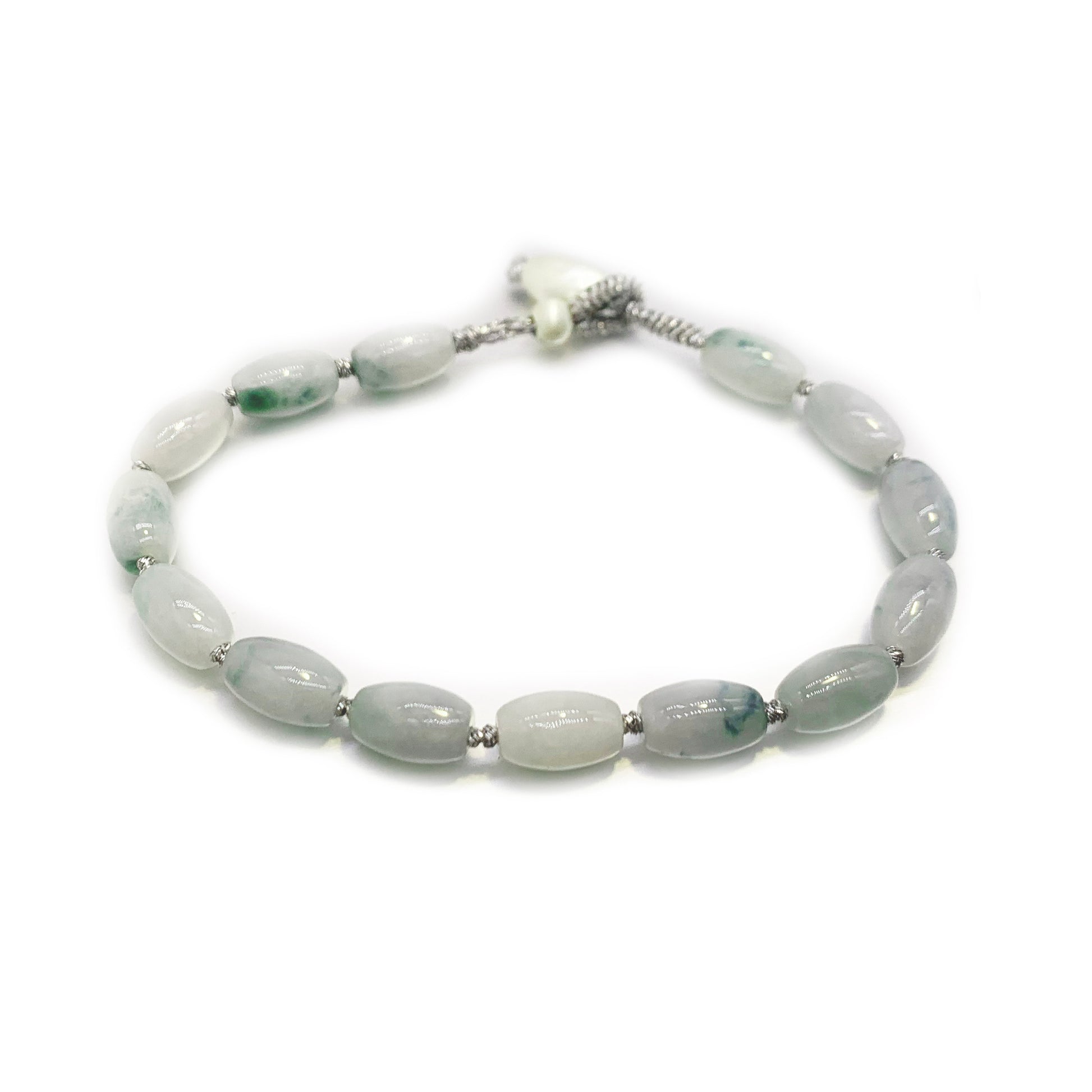 Bracelet with light blue beads on a white background