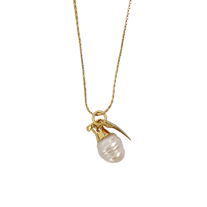 Last Gift · Grenade Pearl Necklace — Gold necklace with a pearl pendant on a white background