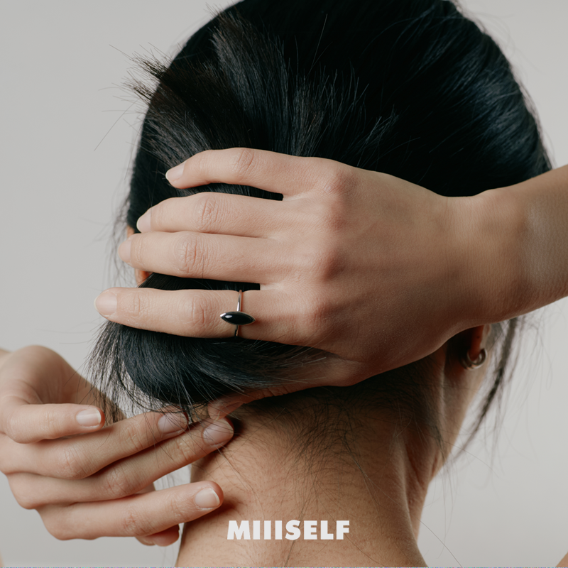 MIIISELF Marquise Onyx Seed Ring from the Nature Force series, featuring minimalist design in rhodium-plated 925 sterling silver.