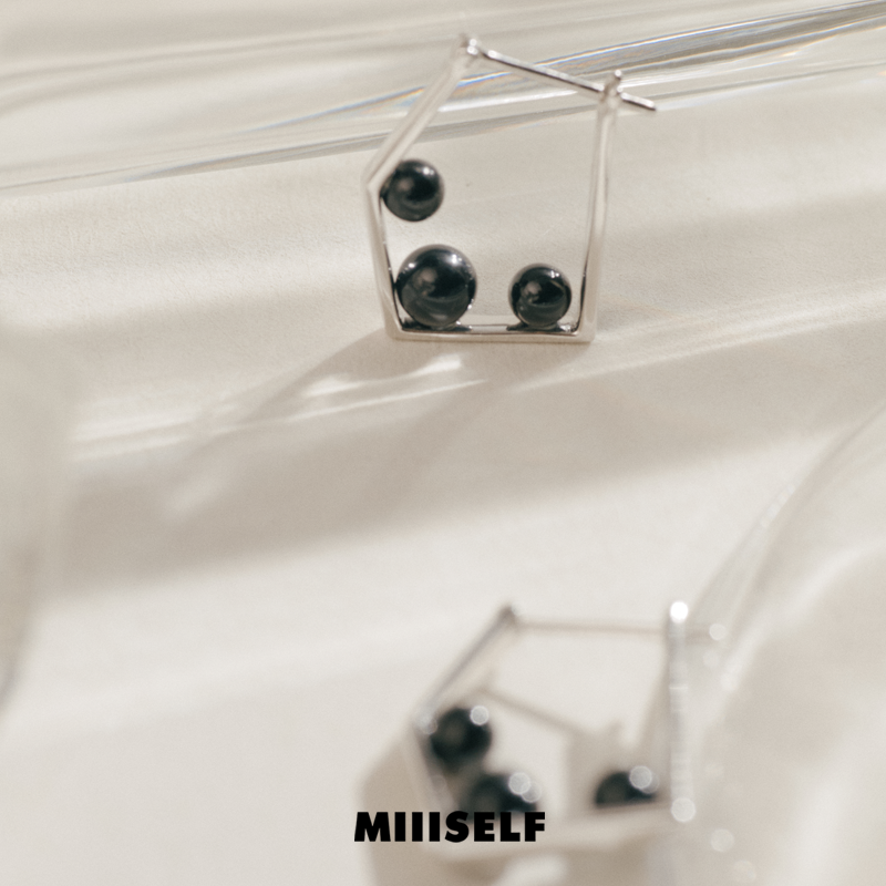 MIIISELF Pentagon Onyx Earrings crafted in rhodium-plated 925 silver with geometric and organic design.