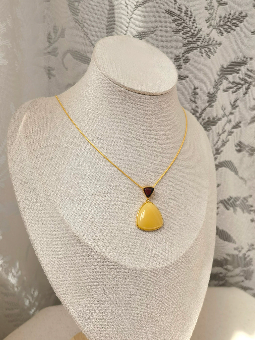 Natural Blood Amber & Beeswax Triangle Necklace — Meicily triangle pendant combining deep blood amber with creamy beeswax