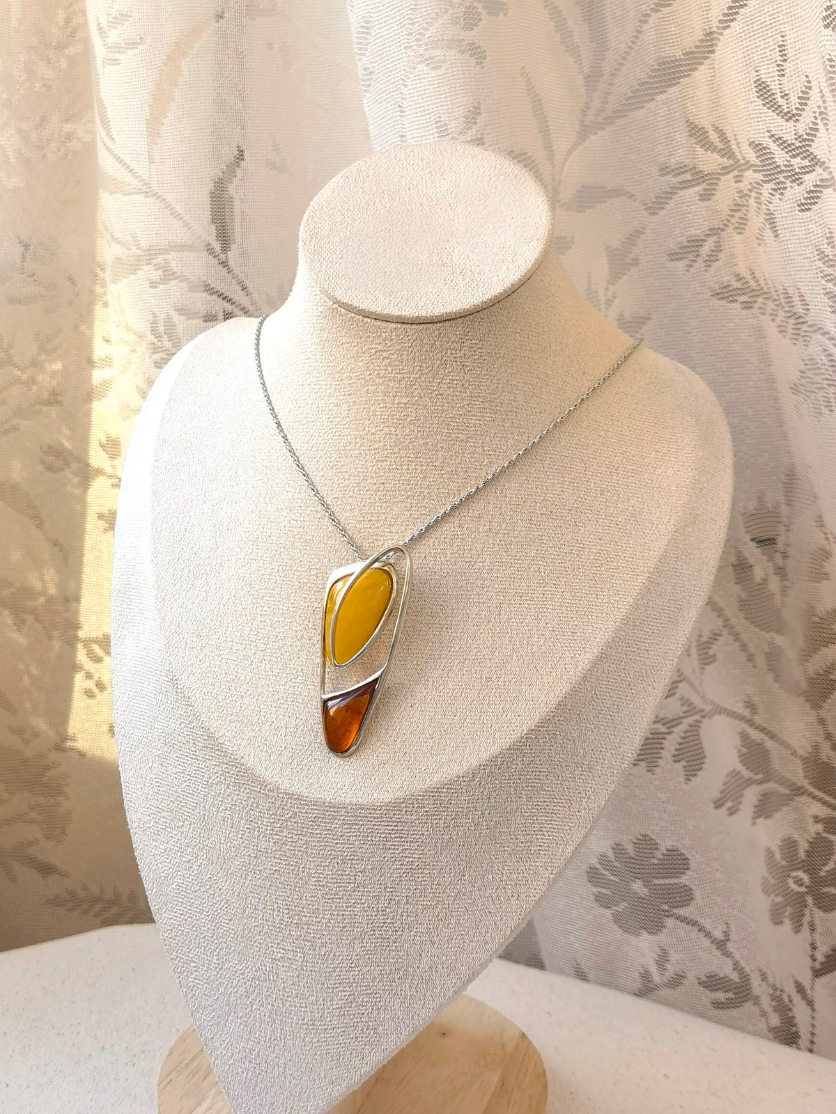 Natural Floral Amber Silver Necklace — Meicily handcrafted amber necklace showcasing natural inclusions and organic contrast