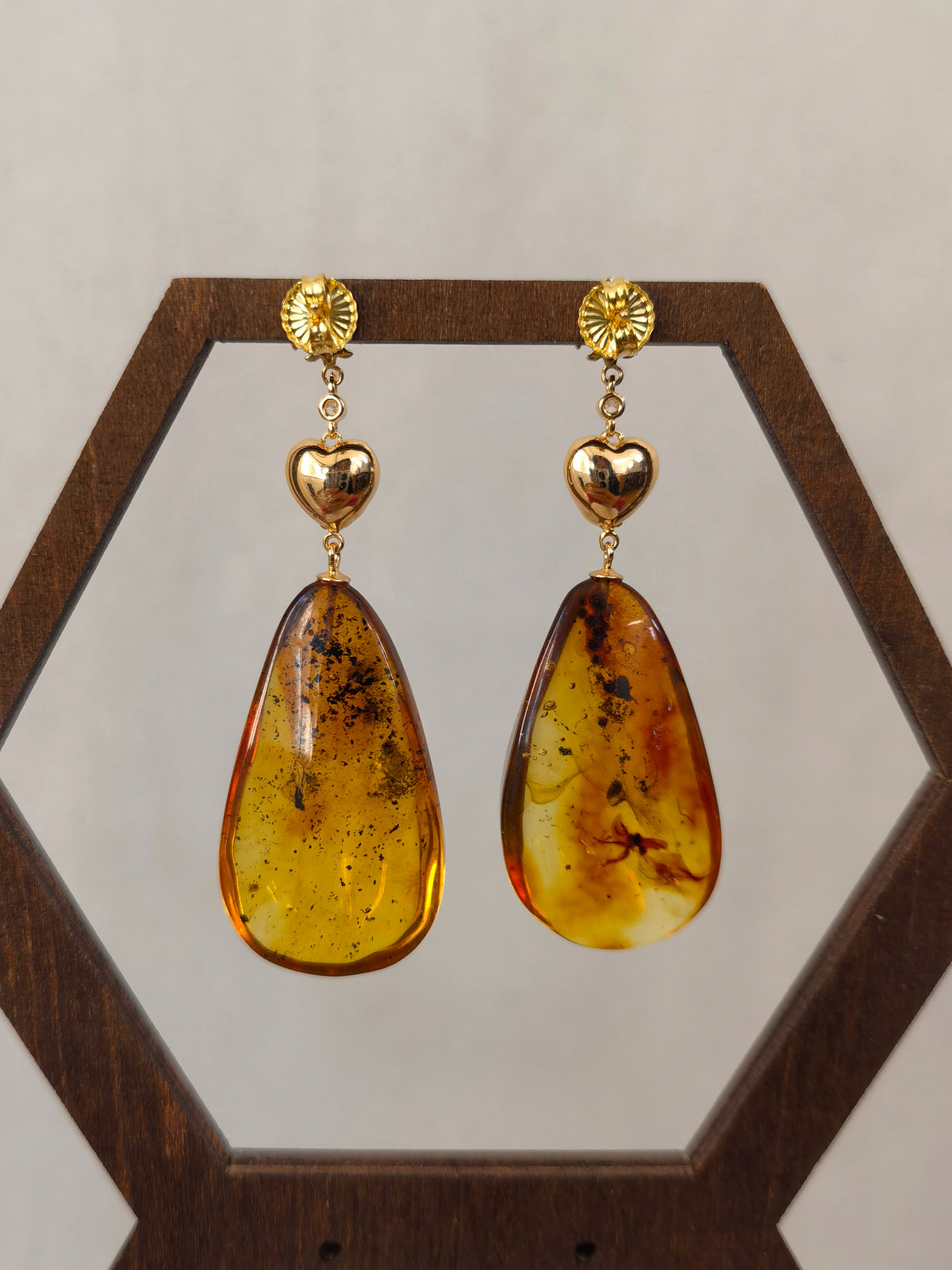 Natural Insect Amber Vintage Heart Earrings — Meicily rock-chic amber heart earrings balancing softness and edge in a