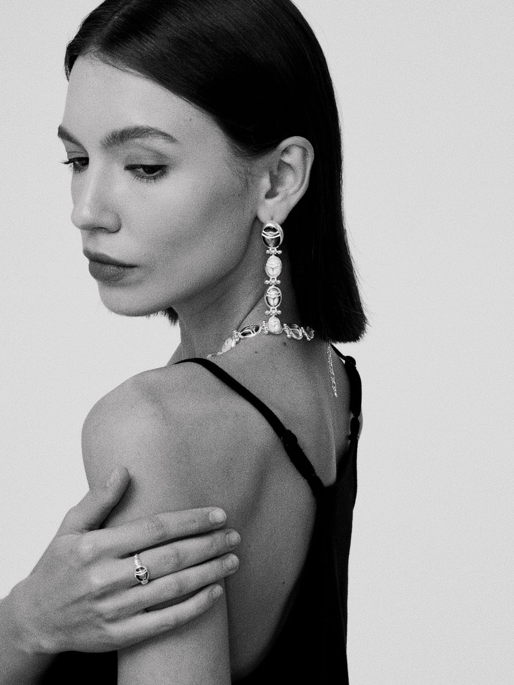 Nomadic Poem · Scarab Mother-of-Pearl Ouroboros Long Earrings — Hand-carved scarab earrings in natural mother of pearl