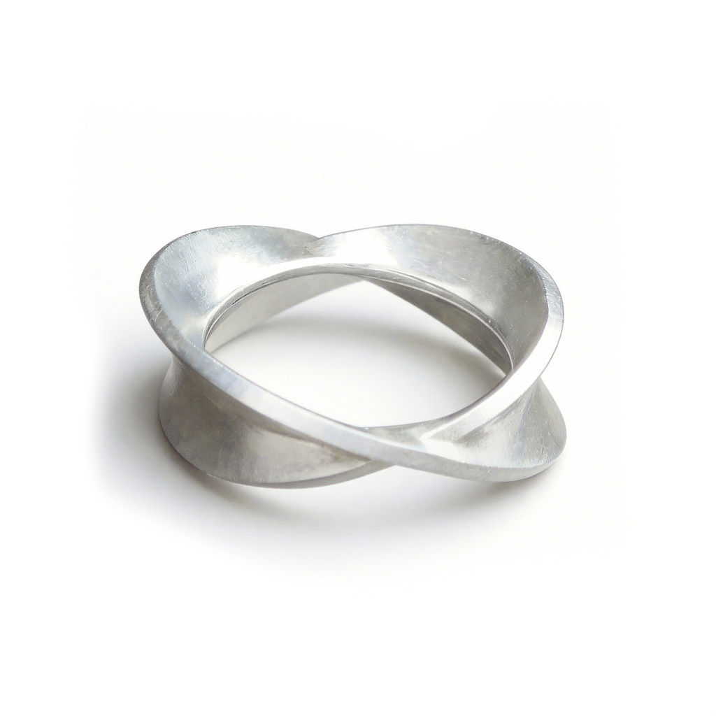 Orbital Cross Twist Band Ring by INVERMAGE, product view 1