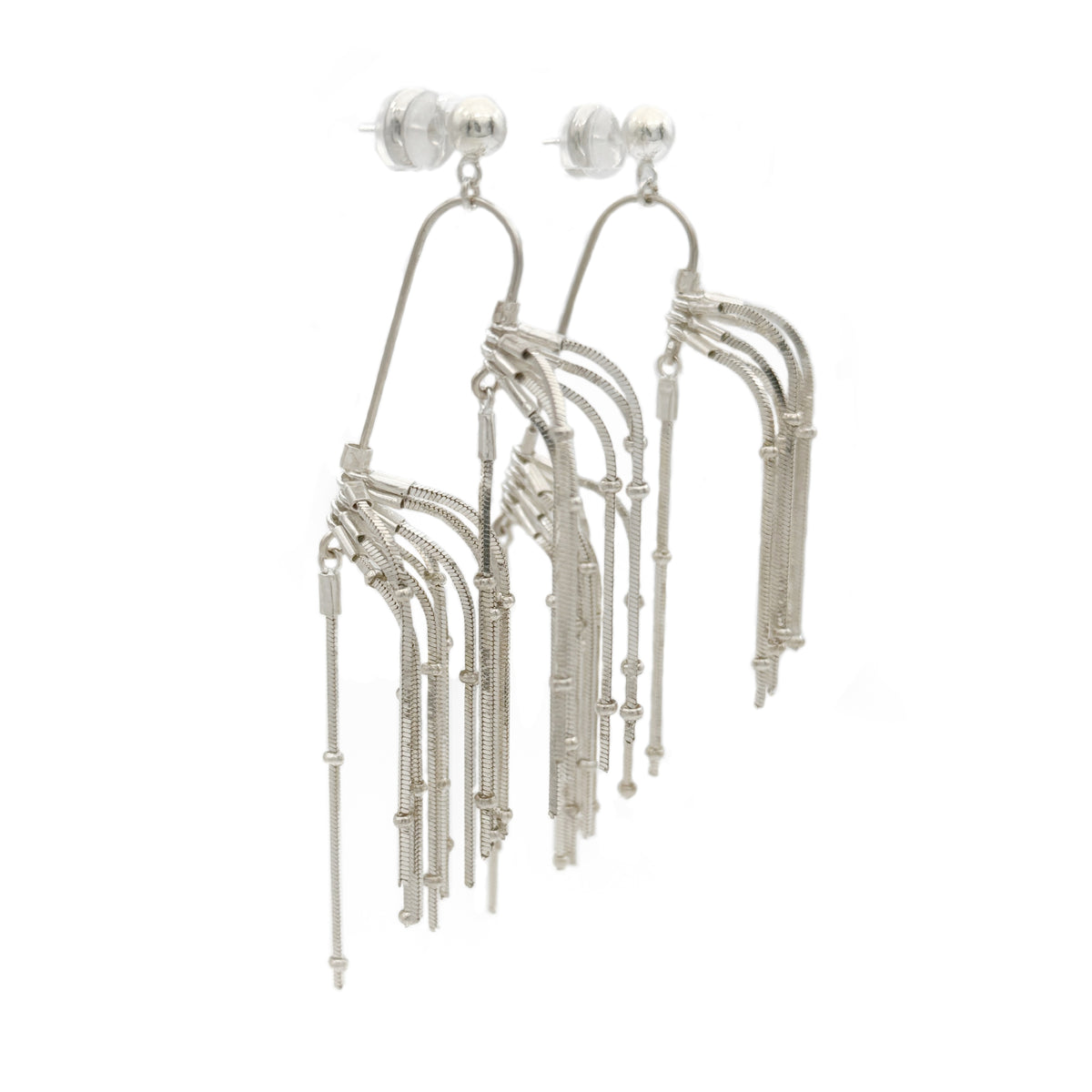 Pine Needle Drop Earrings — Silver fringe earrings on a white background