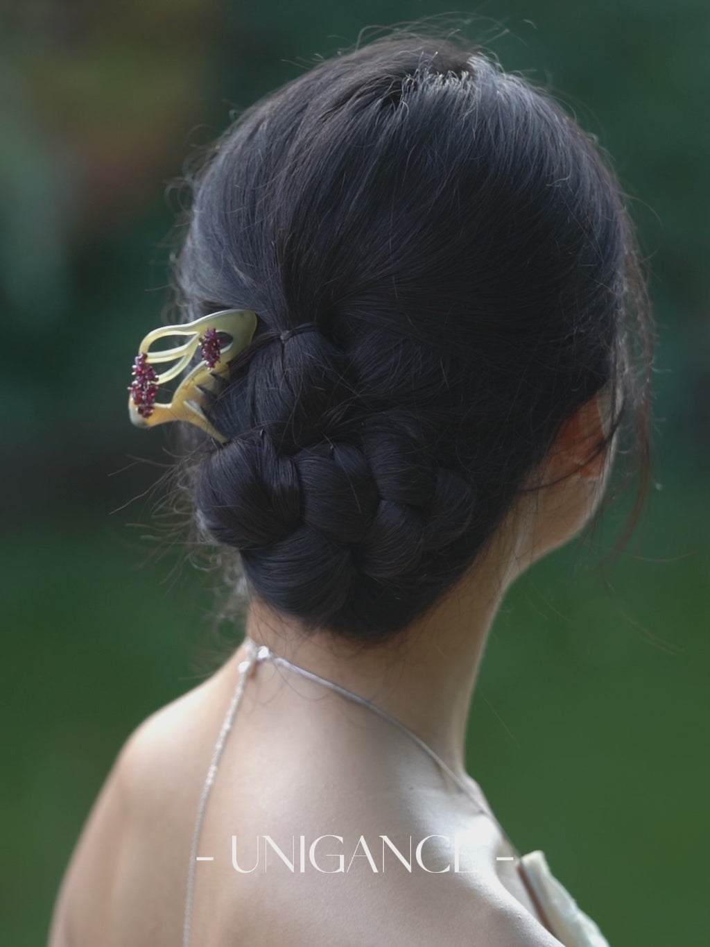 Handcrafted floral branch hair comb with deep red gemstone accents, inspired by traditional Chinese botanical motifs, featuring a carved branching silhouette that expresses layered blossoms, movement, and refined elegance.