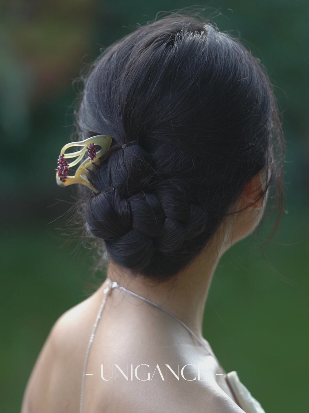 Handcrafted floral branch hair comb with deep red gemstone accents, inspired by traditional Chinese botanical motifs, featuring a carved branching silhouette that expresses layered blossoms, movement, and refined elegance.