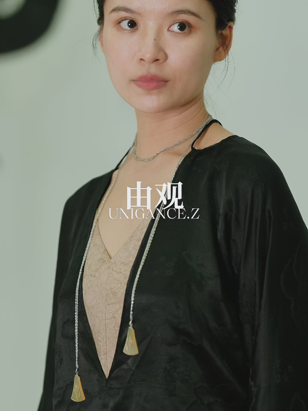 Handcrafted gourd vine long necklace featuring sculptural hand-carved gourd pendants suspended on a slender chain, inspired by Chinese symbolism of abundance, blessings, and continuity, designed as an elegant and understated everyday necklace.