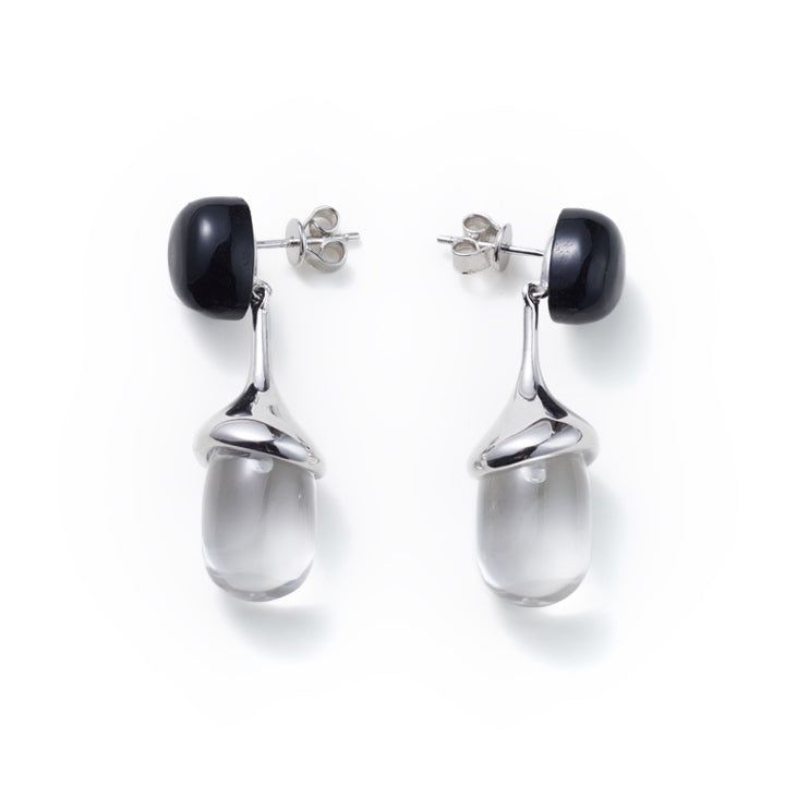 Rain Drop Onyx & Crystal Earrings — Pair of earrings with black and clear teardrop designs on a white background