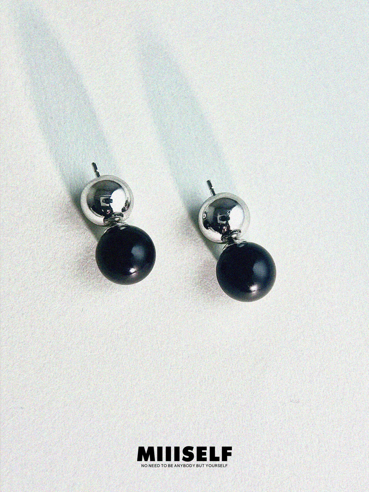 Rain Drop Onyx Convertible Earrings — MIIISELF minimalist fluid earrings with clean curves balancing softness and strength