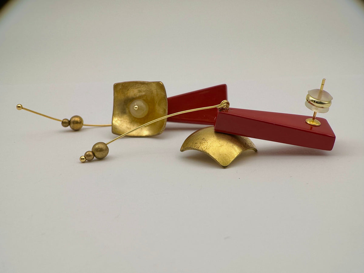 Red Hibiscus Lacquer Quasi-Maki-e Earrings — Gold and red earrings on a white background
