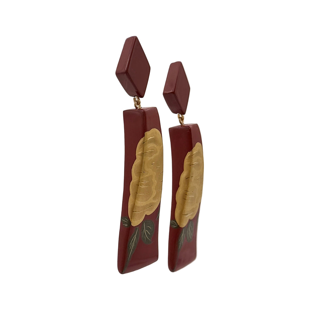 Red Peony Lacquer Quasi-Maki-e Earrings — Pair of earrings with red and gold design on a white background