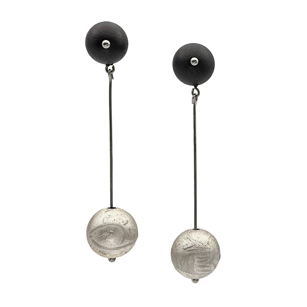 Silverfish Lacquer Quasi-Maki-e Earrings — Pair of earrings with black and silver spherical beads on a white background