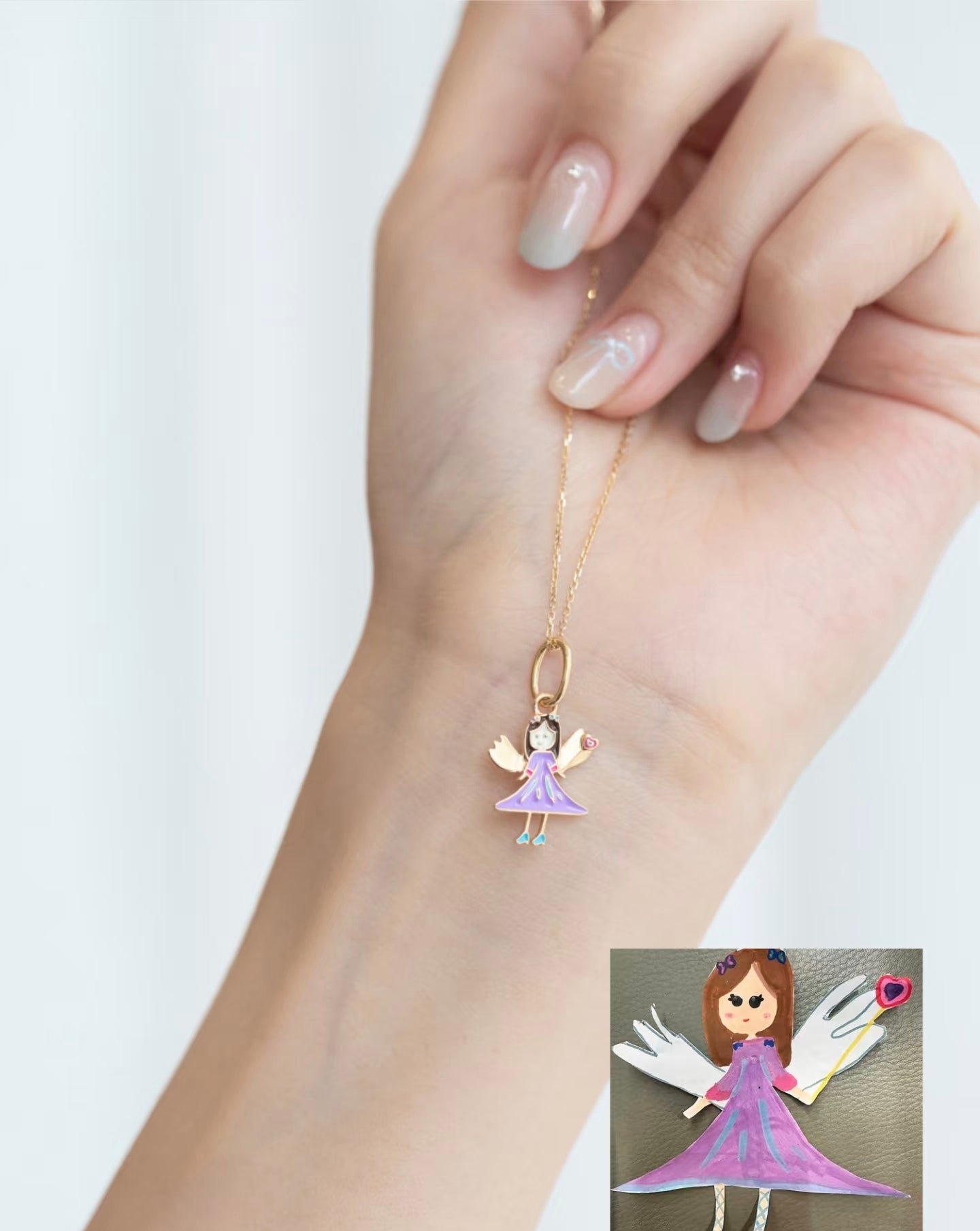 ETEMOM angel girl pendant inspired by children’s artwork with whimsical colors and delicate gold details.