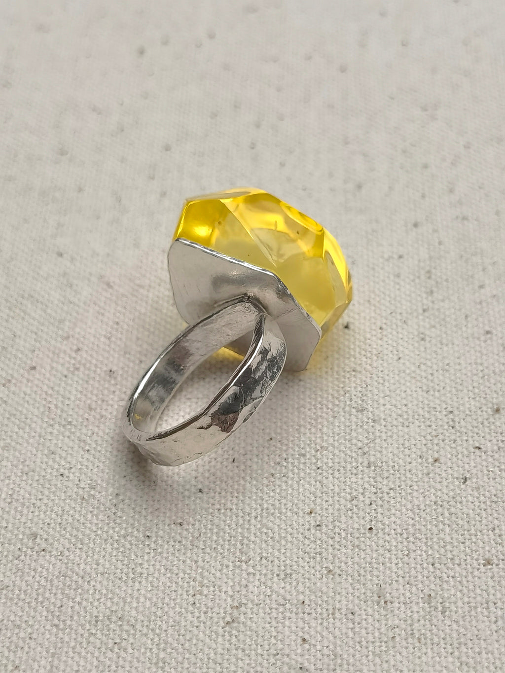 Time Capsule · Golden Amber &amp; Hammered Silver Adjustable Ring — Ring with a yellow gemstone and silver band on a textured