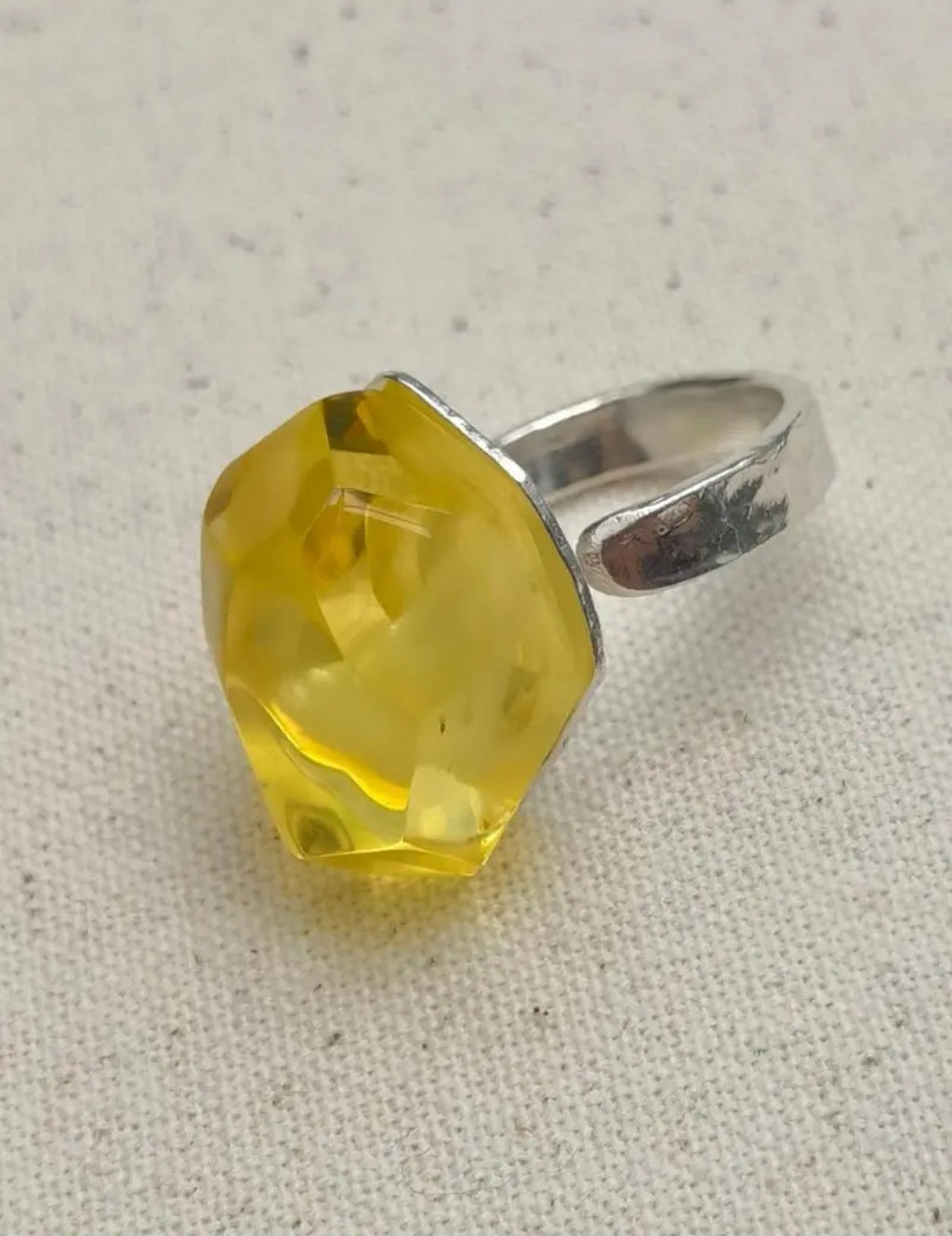 Time Capsule · Golden Amber &amp; Hammered Silver Adjustable Ring — Ring with a yellow gemstone and silver band on a textured