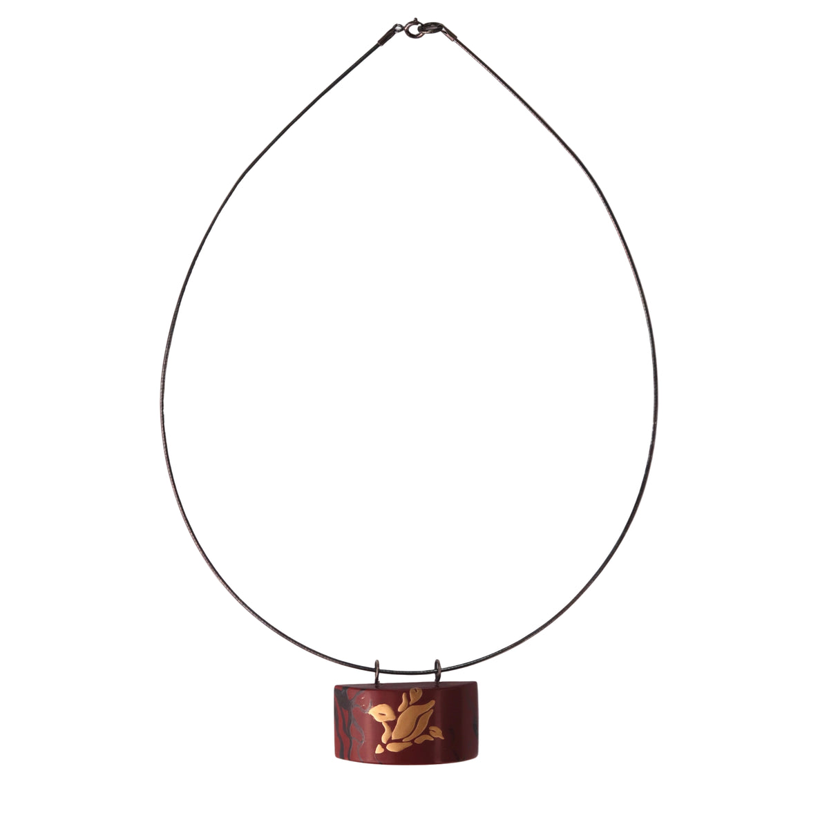 Tranquil Magnolia Lacquer Quasi-Maki-e Necklace — Necklace with a red pendant featuring a gold design on a white background